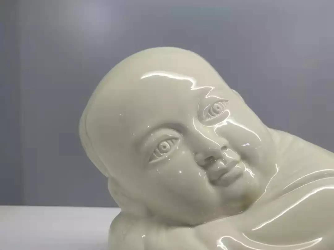 大宋定窯設(shè)計的孩兒枕的局部